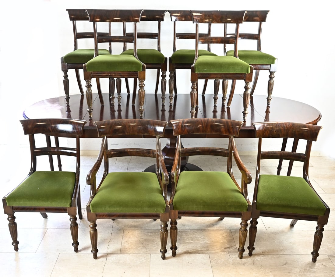 Empire-style dining area + 10 chairs: Large mahogany dining set in Empire style, with extension table + three extra leaves, five in total. With ten chairs. 20th century. Dimensions: 272 x 120 x 80 cm. In good condition.