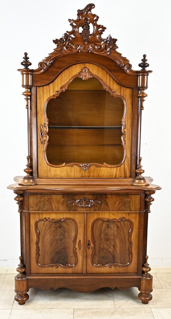 Mahogany happiness, 1860: Dutch, two-part, William III, mahogany bonheur with beautiful carving. Circa 1860. Dimensions: 220 x 100 x 55 cm. In good original condition.