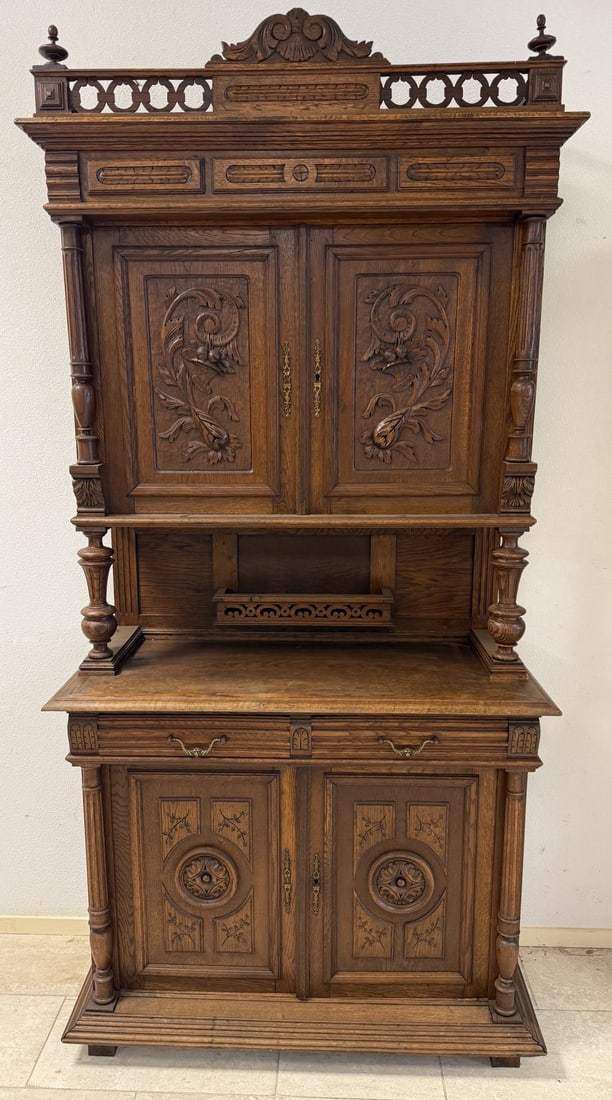 French buffet cabinet, Henri Deux: French oak Henri Deux buffet cabinet with various carvings on the doors + original crown with crest. Circa 1880. Dimensions: H 238 x W 115 x D 51 cm. In good condition.