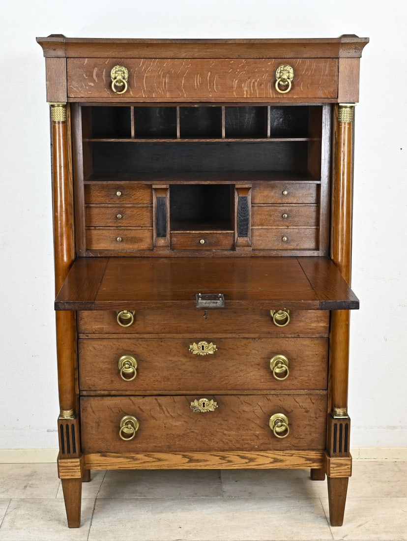Louis XIV secretary, 1800: Dutch oak Louis Seize secretary desk with solid columns and brass capitals. Circa 1800. Dimensions: 162 x 100 x 44 cm. In good condition.