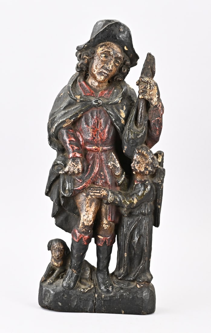 Statue, St. Rochus, (17th century): 17th-century wood-carved St. Roch with angel, with original polychromy. Dimensions: 48 cm. In good condition.