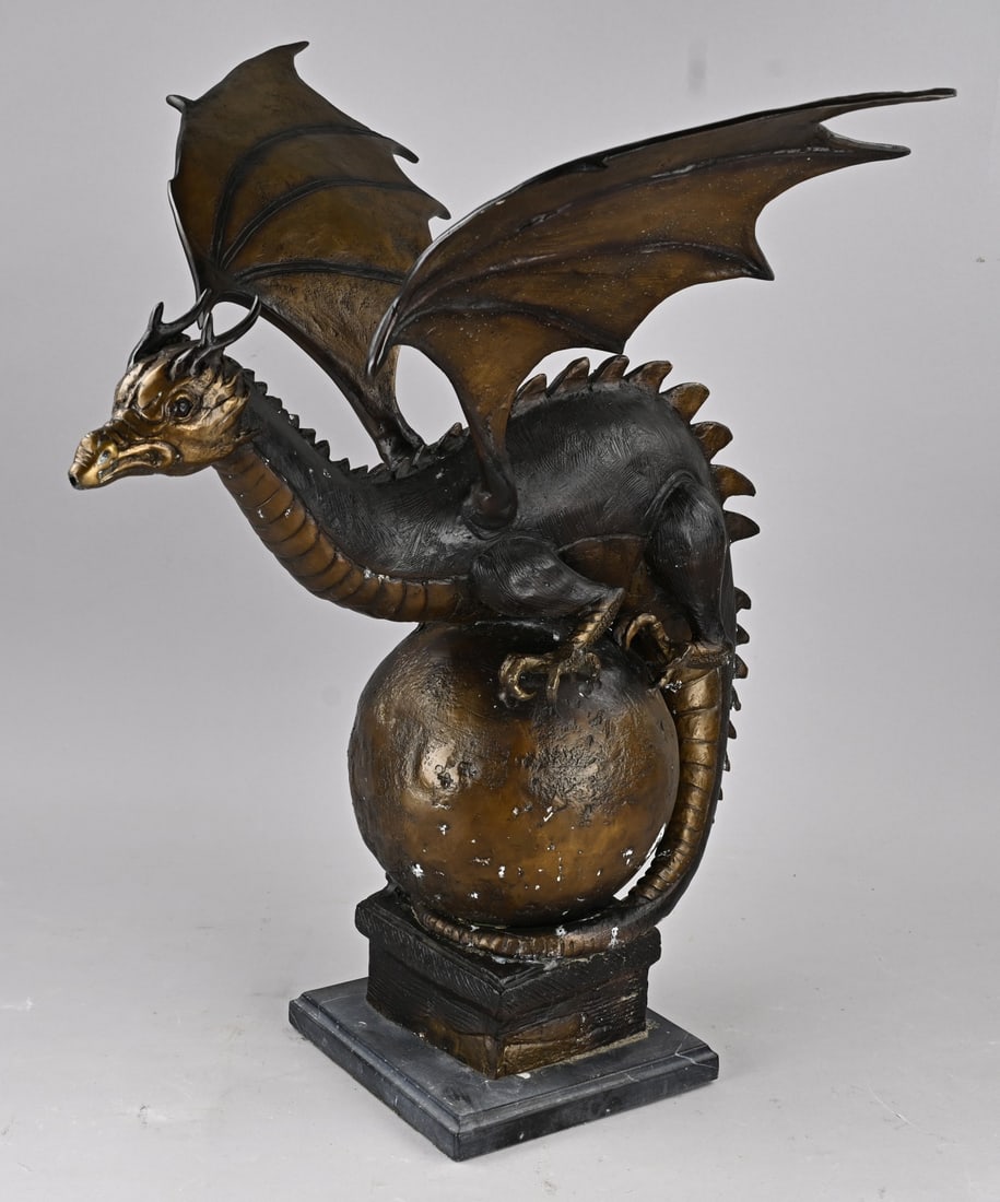 Bronze dragon: Large bronze dragon, sitting on a sphere. 21st century. Dimensions: 64 x 57 x 52 cm. In good condition.