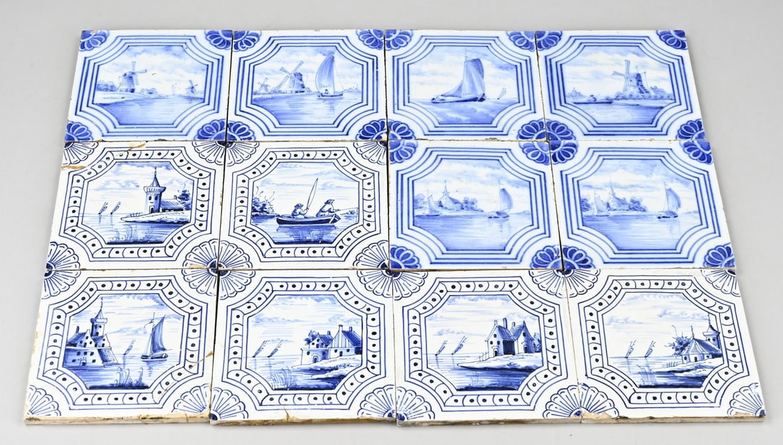 Lot with 12 tiles: Lot of twelve antique Dutch landscape/water feature tiles. Circa 1900. Dimensions: 13 x 13 cm. In good condition.