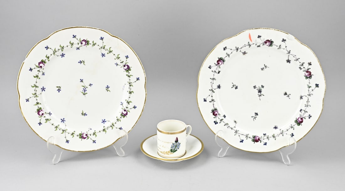 3 Pieces of antique porcelain: Three pieces of antique porcelain. 2x Amstel plate, circa 1800, with floral/gold decoration, rim damage. 1x French cup and saucer with text and base mark with swords, 19th century, one chip.