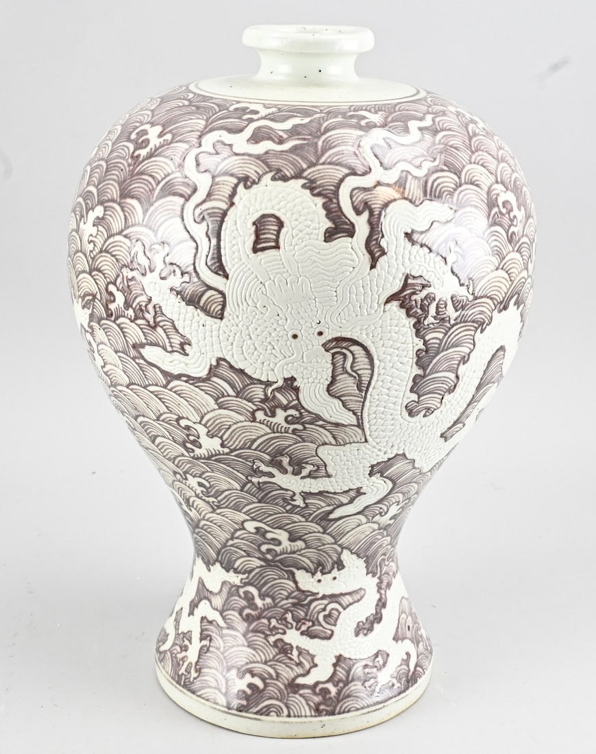 Meiping dragon vase, H 46.3 cm.: Chinese porcelain meiping relief dragon vase with oxidized red decoration. Dimensions: H 46.3 cm. In good condition.