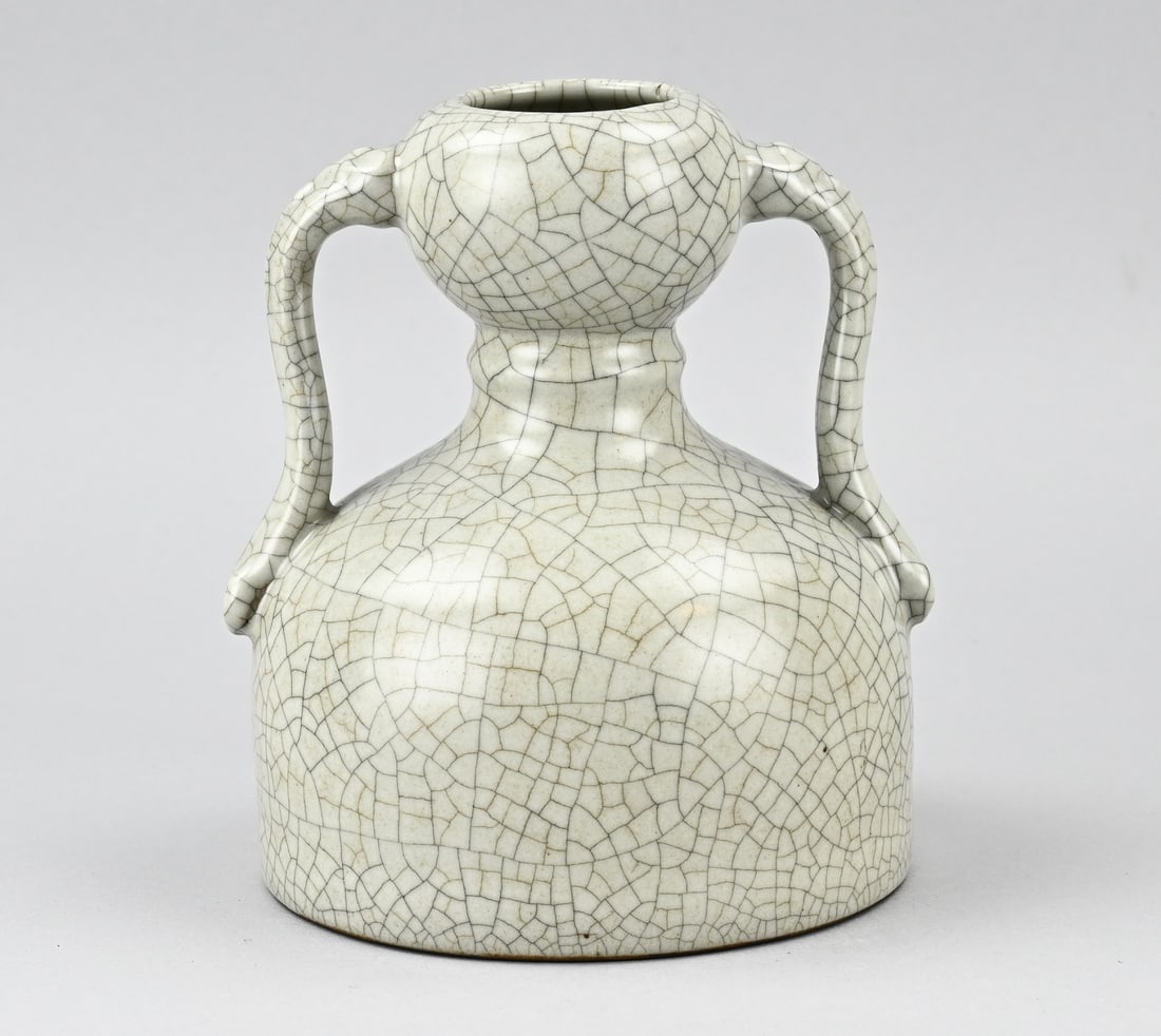 Celadon vase, H 18.4 cm.: Old Chinese porcelain celadon bulbous vase with handles and base mark. Dimensions: H 18.4 cm. In good condition.