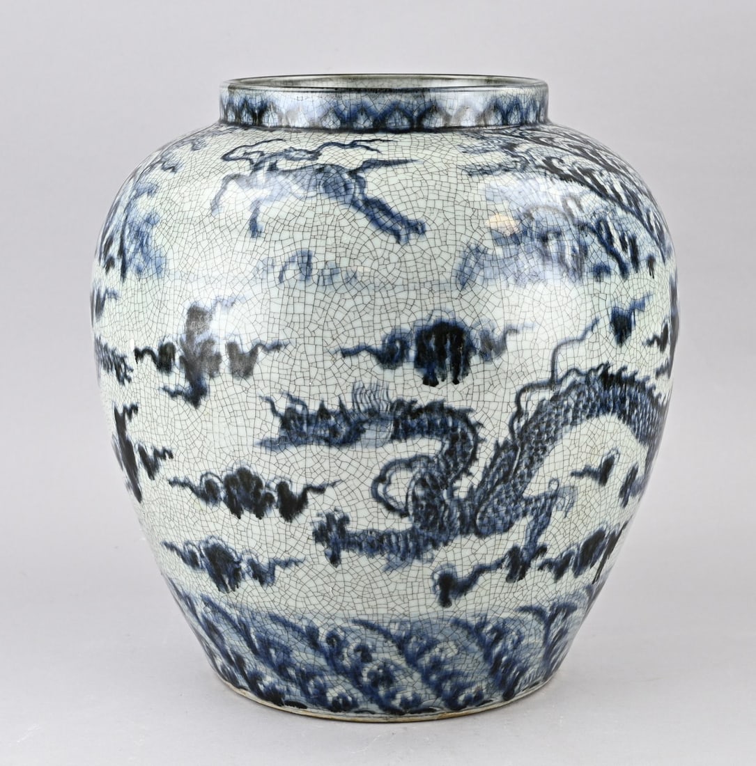 Chinese celadon vase, H 36 cm.: Chinese porcelain celadon vase with dragons in a cloud decoration. Dimensions: H 36 cm. In good condition.
