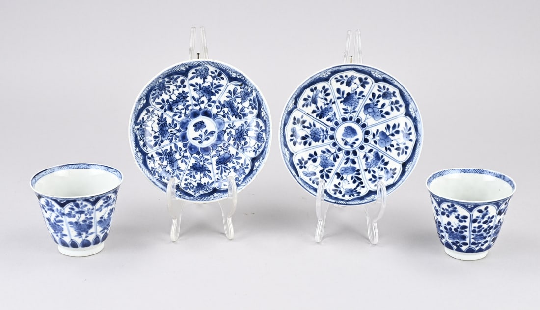 Chinese cup/saucer(s): Two 18th-century Chinese porcelain Kang Xi cups and saucers. Floral decoration. Base mark. Dimensions: 8 x 12.5 cm. Minimal chip. In fair/good condition.