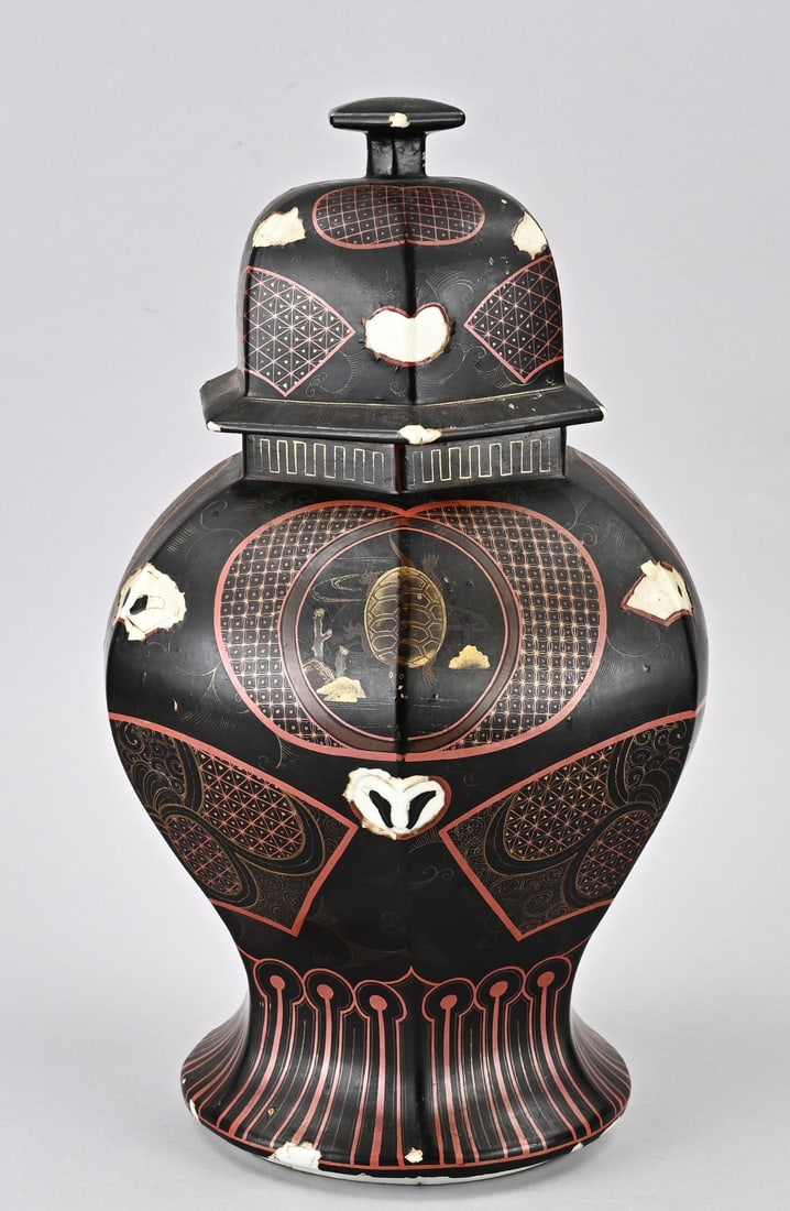 Japanese lidded vase: 19th-century Japanese lidded vase with black glaze and koi carp/fruit decoration. Dimensions: H 39 cm. Glaze loss. In reasonable condition.