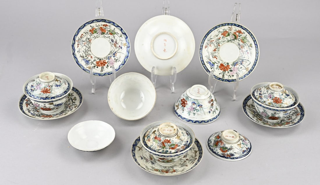 Eggshell cups/saucers (Japan): Set of antique Japanese eggshell porcelain cups and saucers with lids. Circa 1900. Floral/fruit/bird decoration. Base mark. Dimensions: 9 x Ø 12 cm. One minimal chip. In good condition.