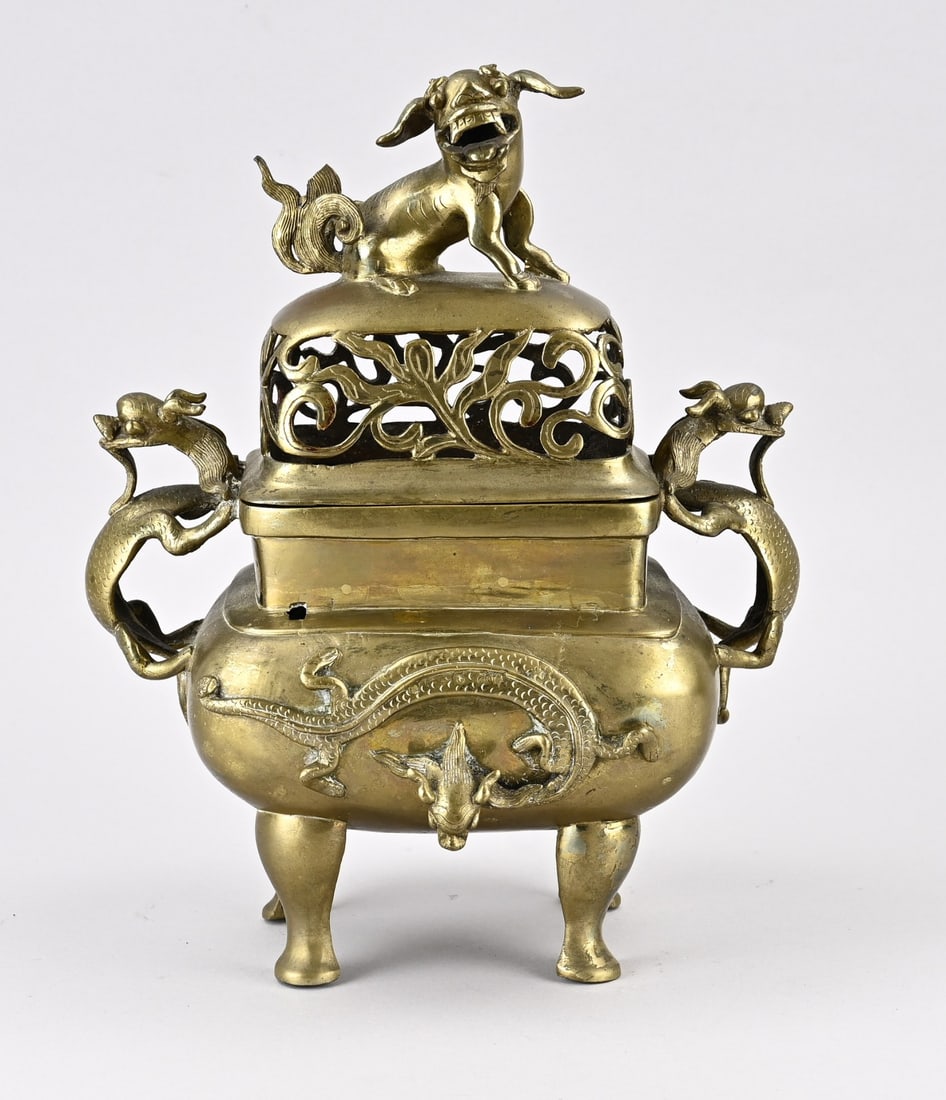 Chinese incense burner: Antique Chinese gilded bronze incense burner with kylins, dragon + base mark. Dimensions: 33 x 26 x 18 cm. One hole in the burner. In good condition.