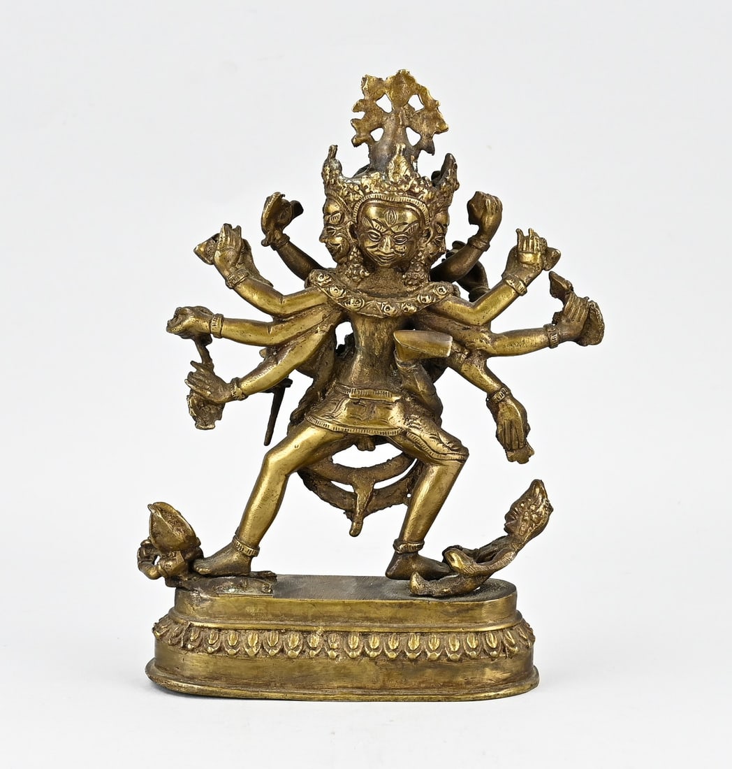 Buddha (Nepal): Old bronze Buddha figure with eight arms + figures. Nepal. 20th century. Dimensions: H 25 cm. In good condition.