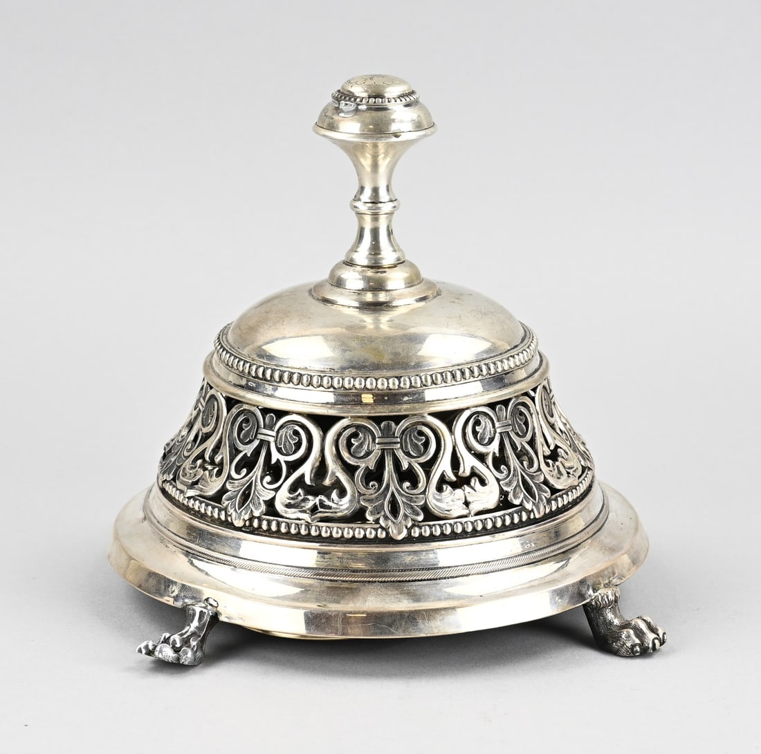 Silver holder with (church) bell: Beautiful silver (church) bell, 833/000, round openwork holder decorated with curled floral motif and a beaded rim, mounted on 4 claw feet, all 4 restored. The holder has a handle with a beaded rim