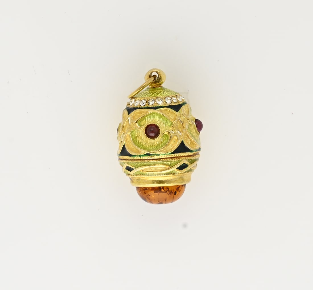 Silver-plated enamel egg pendant: Silver-plated egg pendant, 925/000, decorated with enamel and amber. Fabergé style. New. 33x17mm. including eyelet.
