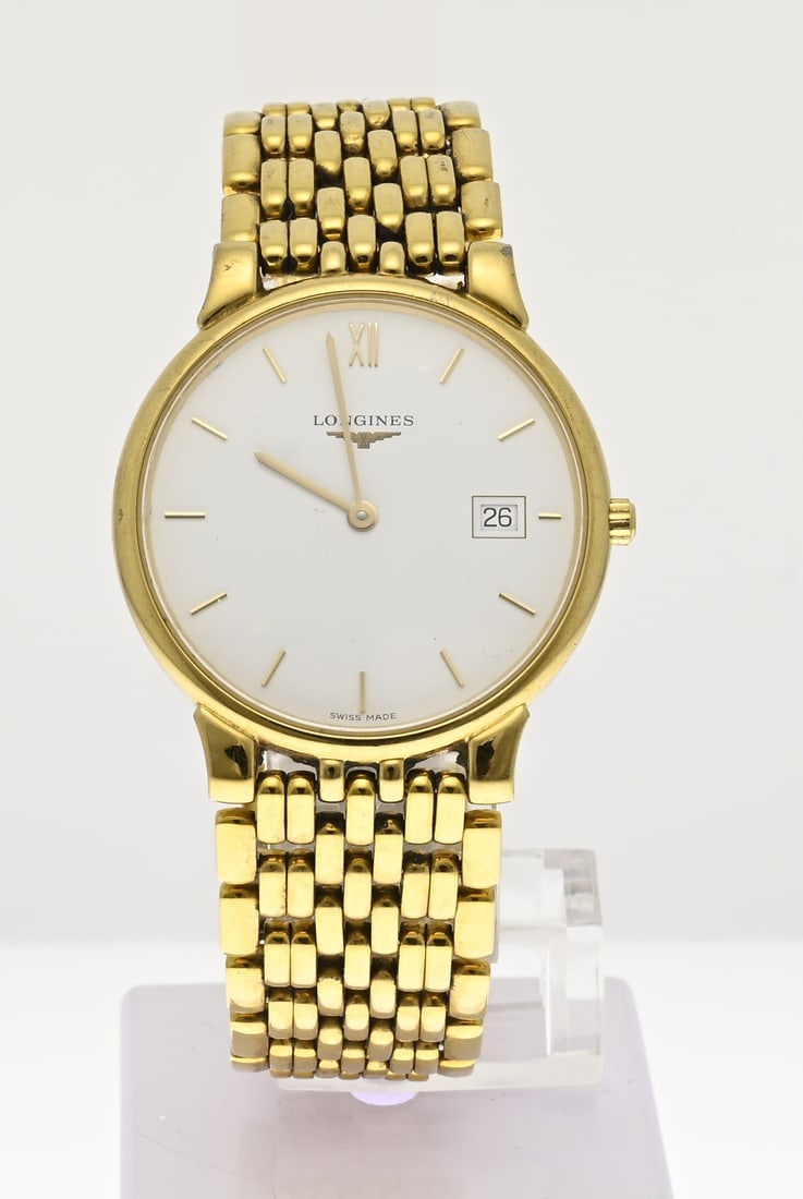 Longines: Longines watch, gold-plated steel, Les Grandes Classiques de Longines, unisex model, ø 34 mm. Quartz. Mounted on a link bracelet. Features a white dial with date display. Case number: 29338872. In go