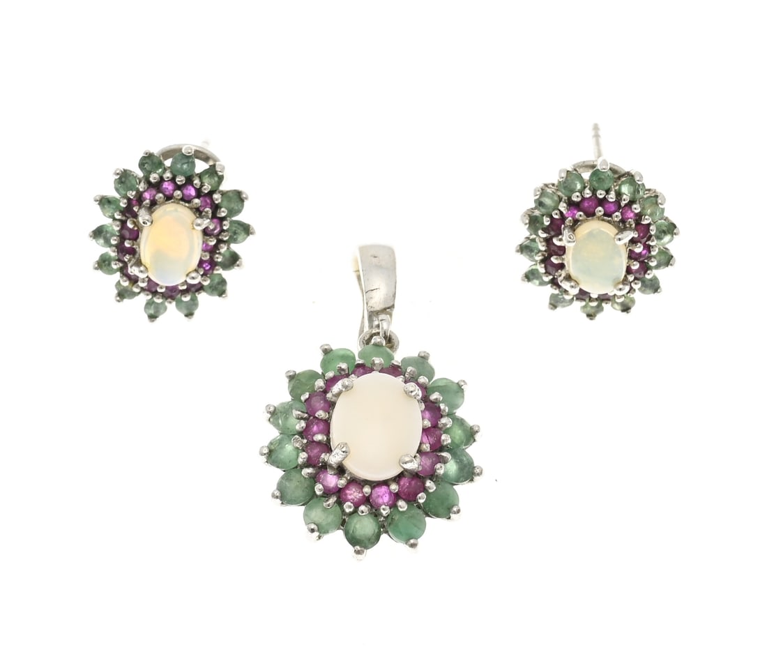 Silver earrings and pendant: Silver pendant and earrings, 925/000, oval rosettes with an opal cabochon in the center surrounded by a border of rubies and a border of emeralds. 32x18mm, including clip pendant and 13x16mm stud