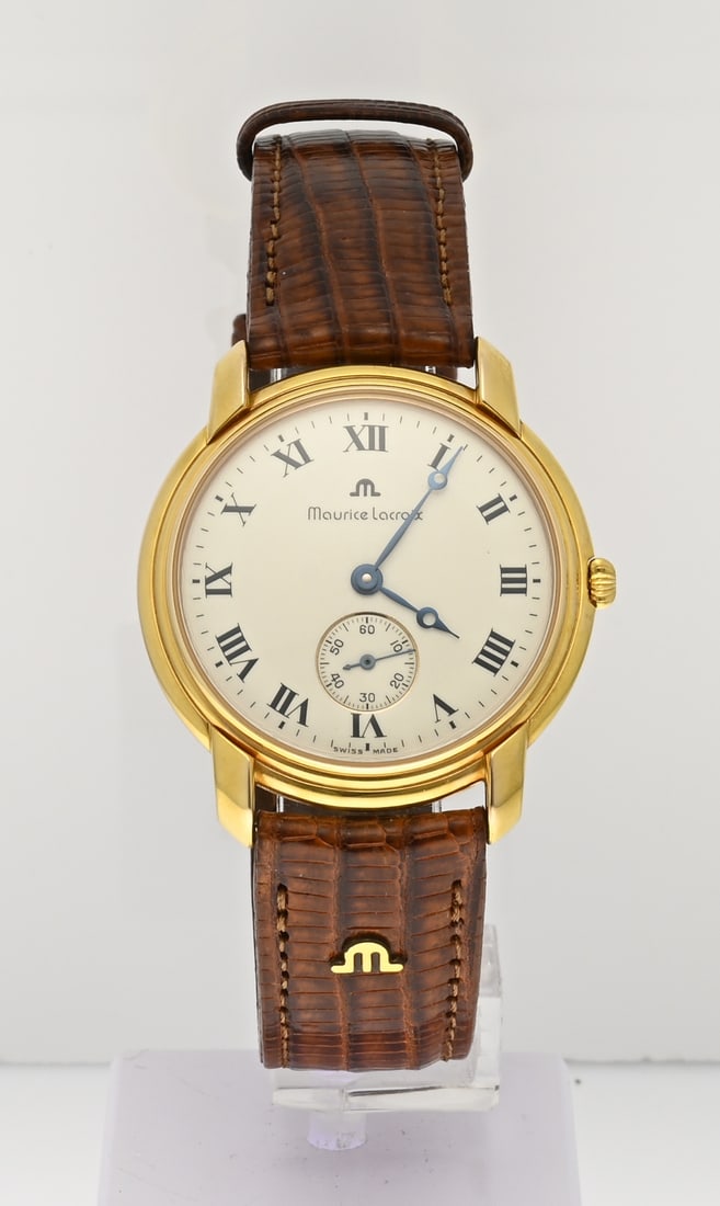 Maurice Lacroix les classique leather: Maurice Lacroix watch, Les Classique, mechanical, gold-plated with an ornate dial featuring a decentralized seconds hand. Case diameter 36 mm. Case number: 26318/0524. Fitted with an original strap.