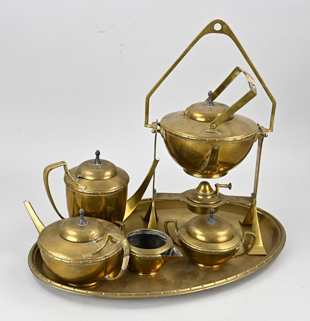 Tea set (WMF): Complete German brass tea set with WMF + ostrich base marks. Jugendstil/Art Deco. Circa 1915. Dimensions: 12 x 53 cm. In good condition.