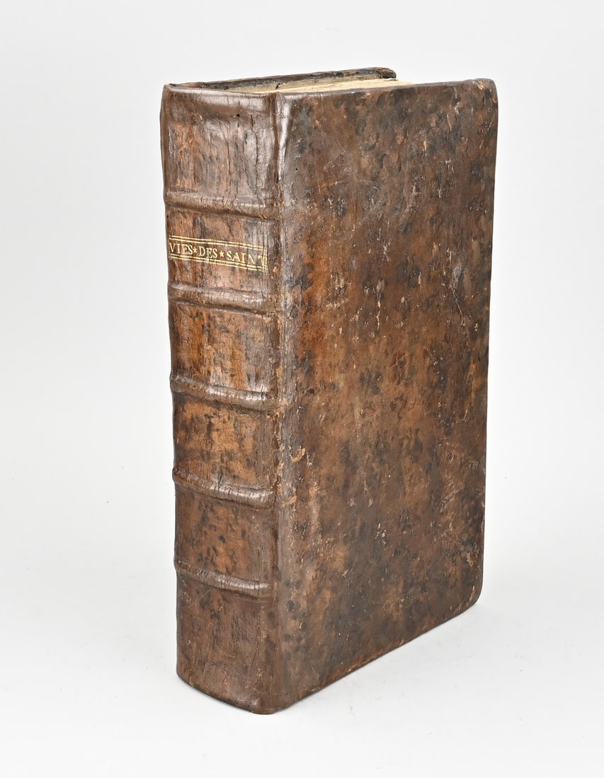 French Bible: 17th-century French Bible. Les Fleurs de Vies des Sainct's et Festes de Toute L'annee, Last Edition. Original binding. Possibly incomplete. Dimensions: 35 x 23 x 9 cm. Older restoration. In