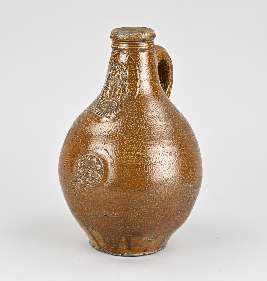 Bearded man jug, H 23 cm.: 17th-century German Frechen stoneware bearded man jug with medallion. Dimensions: H 23 cm. In good original condition.