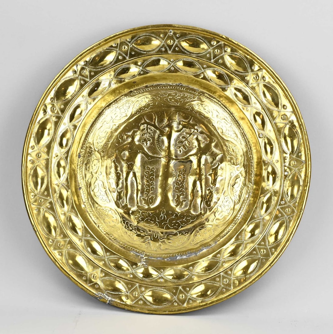 Dutch christening dish Ø 48.5 cm.: 18th-century Dutch gilt brass baptismal bowl with Adam and Eve in a paradise setting. Dimensions: Ø 48.5 cm. In good condition.