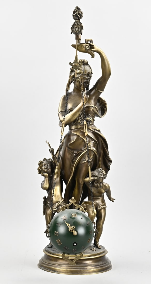 Mysterious clock, 71 cm.: Large, mysterious bronze swing-ball clock with a group of figures. France. 20th century. Eight-day movement. Dimensions: 71 cm. In good working condition.