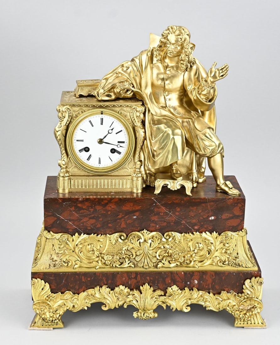 Charles Dix pendulum, 1840: Antique, French, fire-gilded bronze Charles Dix pendulum clock with scholar + marble. Circa 1840. Eight-day movement with string pendulum. Dimensions: 45 x 36 x 11 cm. In good condition.