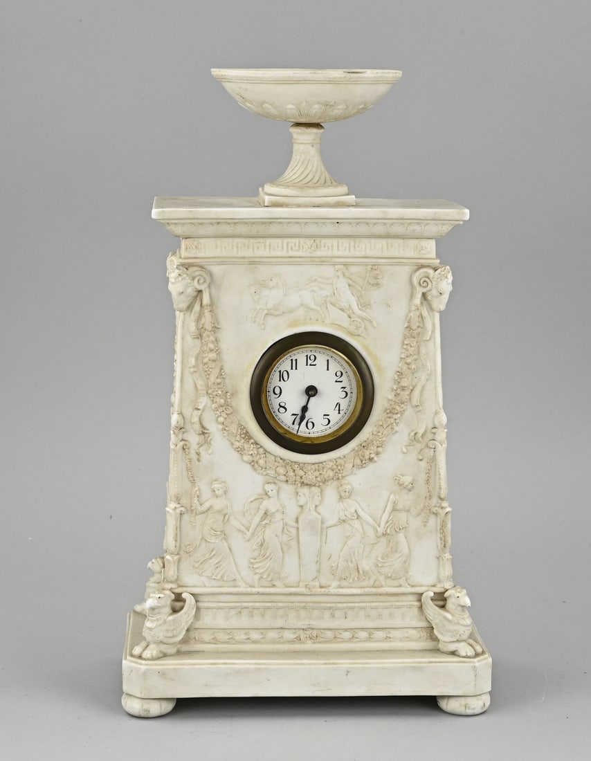 Table pendulum, 1900: Antique biscuit porcelain table clock in Empire style, with alarm movement. Circa 1900. Dimensions: H 32.7 cm. One chip. In good condition.