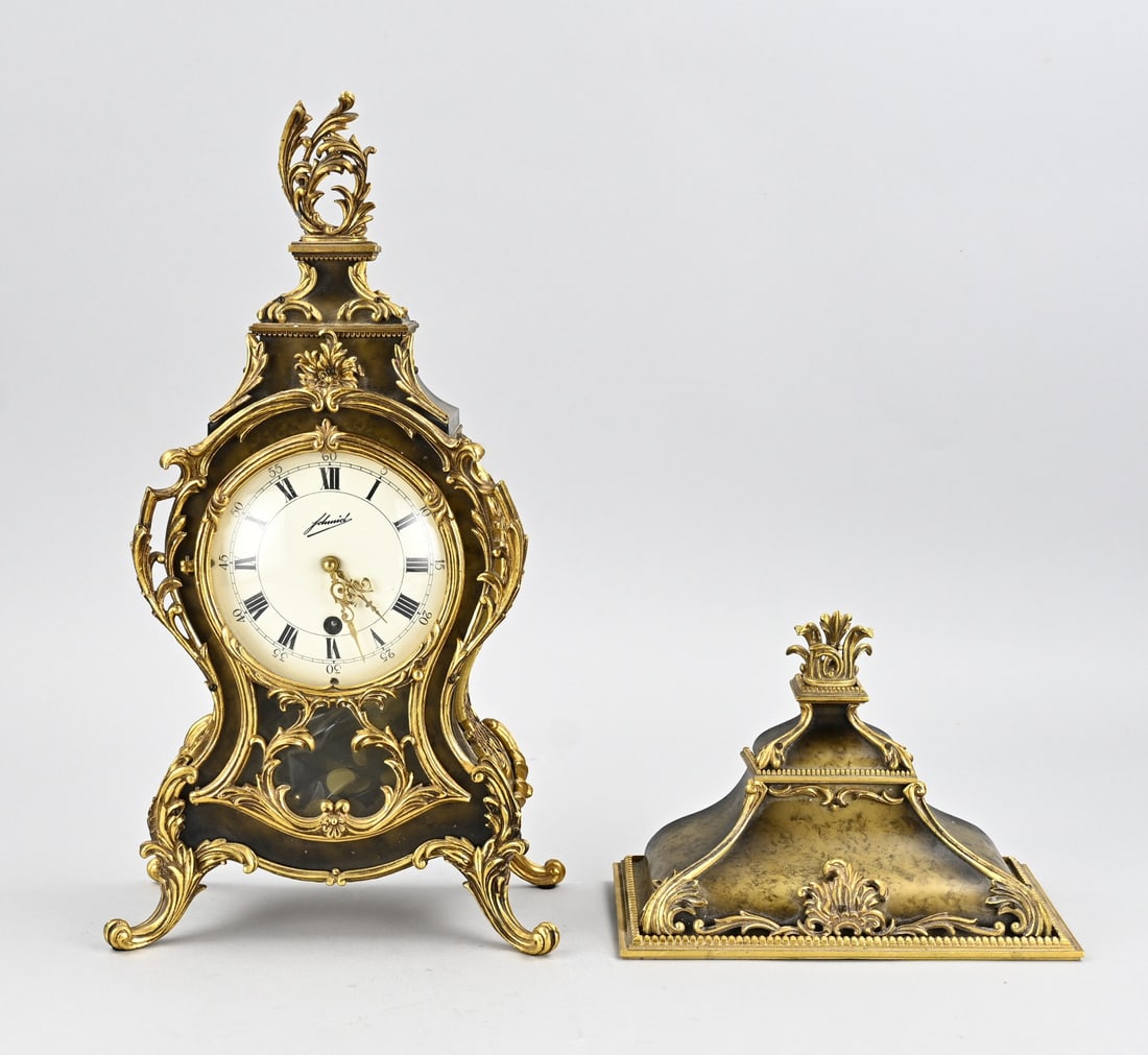 Schmidt console clock, 1970: Old German plastic Schmidt console clock with silent movement but with brass appliques. Circa 1970. Dimensions: H 53 cm. In good condition.