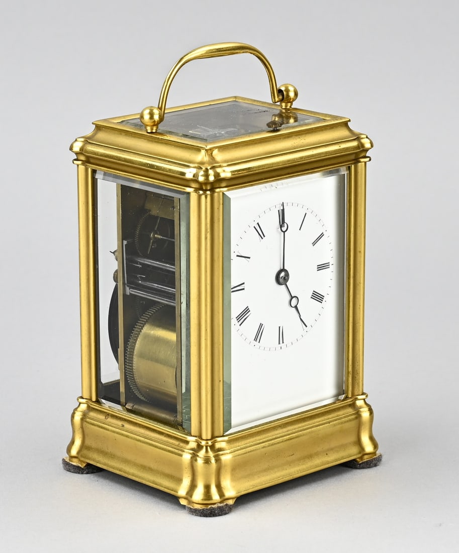 French travel alarm clock, 1900: Antique, French, gilded brass travel alarm clock with quarter-hour strike on double gong spiral + switch (clock, silent, quarters). Eight-day movement. Circa 1900. Dimensions: 16 x 9 x 9 cm. In good