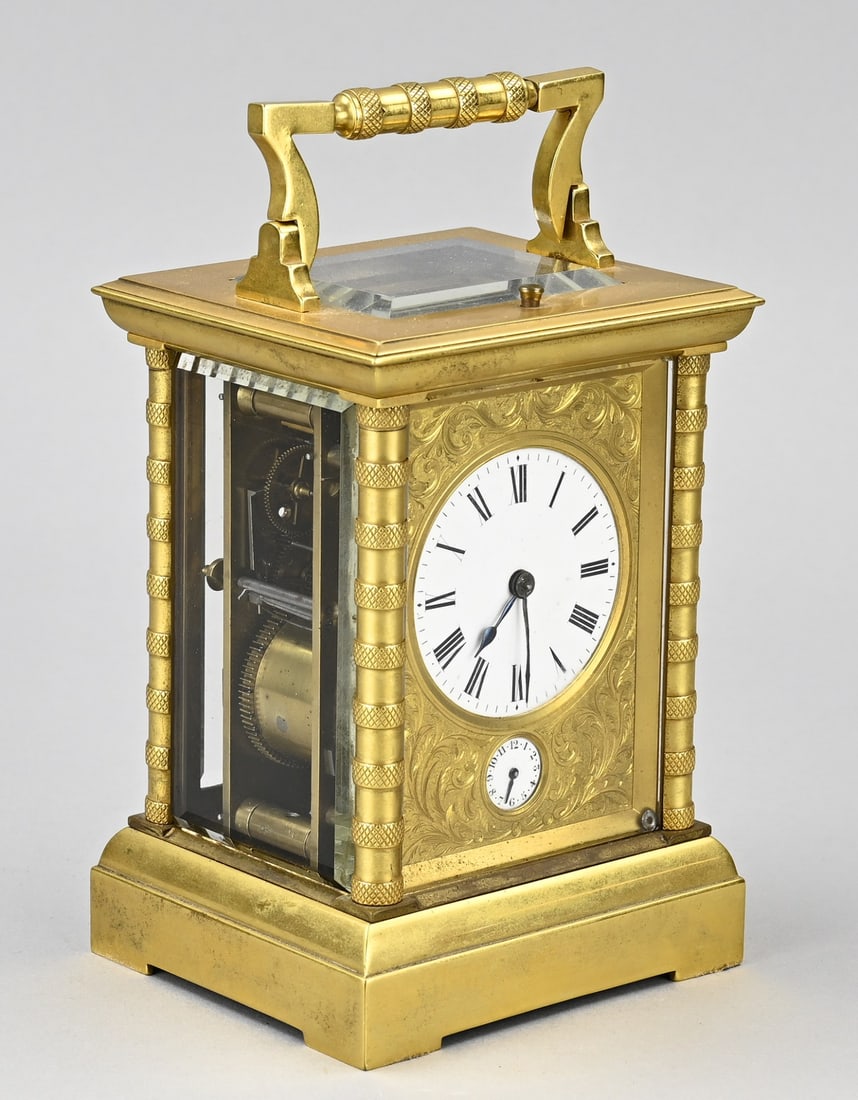 French travel alarm clock, 1890: Beautiful antique French gilded brass travel alarm clock with half-hour strike on a gong spiral. Eight-day. By Surety Poller. Circa 1890. Dimensions: 17 x 10.5 x 9 cm. In good working condition.