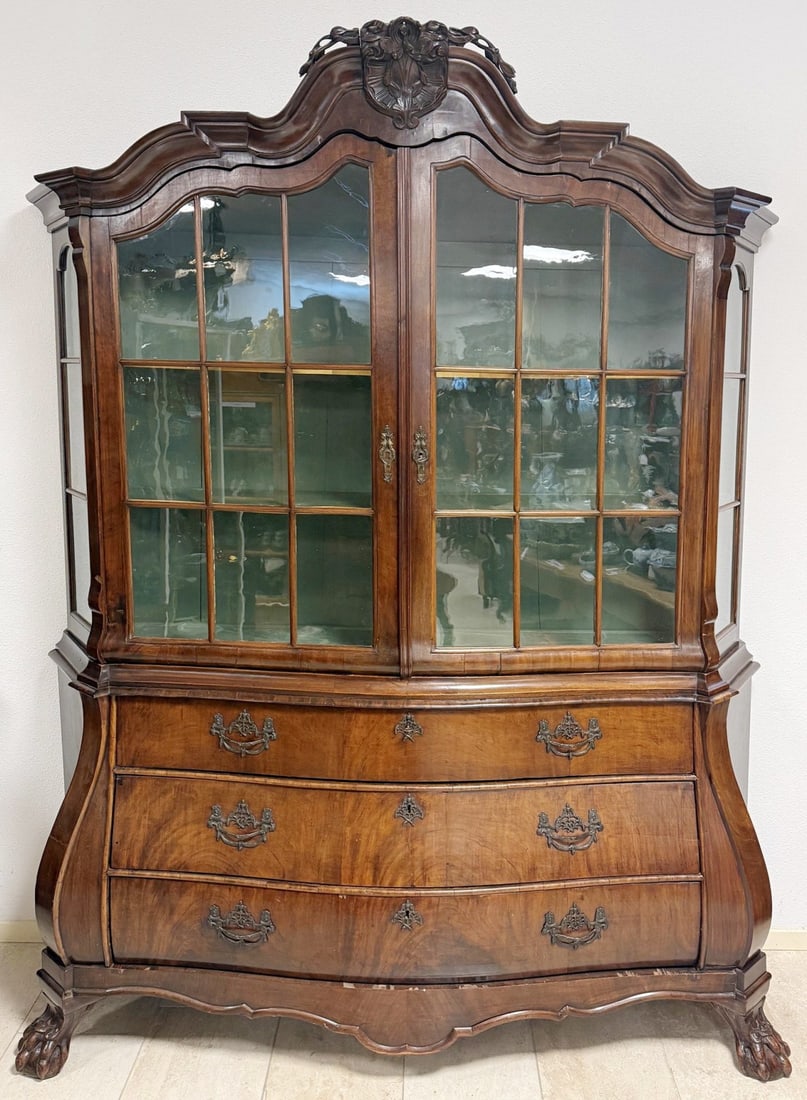 Mahogany bombé 18th-century display cabinet: 18th-century Dutch Louis XV Baroque mahogany display cabinet with original bronze fittings and a bombé front. Dimensions: 240 x 185 x 55 cm. In good, unrestored condition.