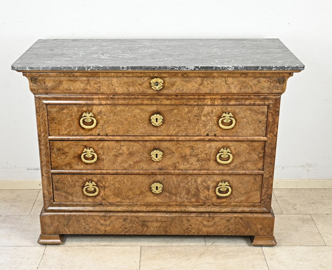 Burr walnut Charles Dix chest of drawers: Beautiful French Charles Dix chest of drawers in burr walnut. With four drawers and original gilded bronze fittings, locks, and a marble top. Also features an extra drawer in the plinth. Dimensions: