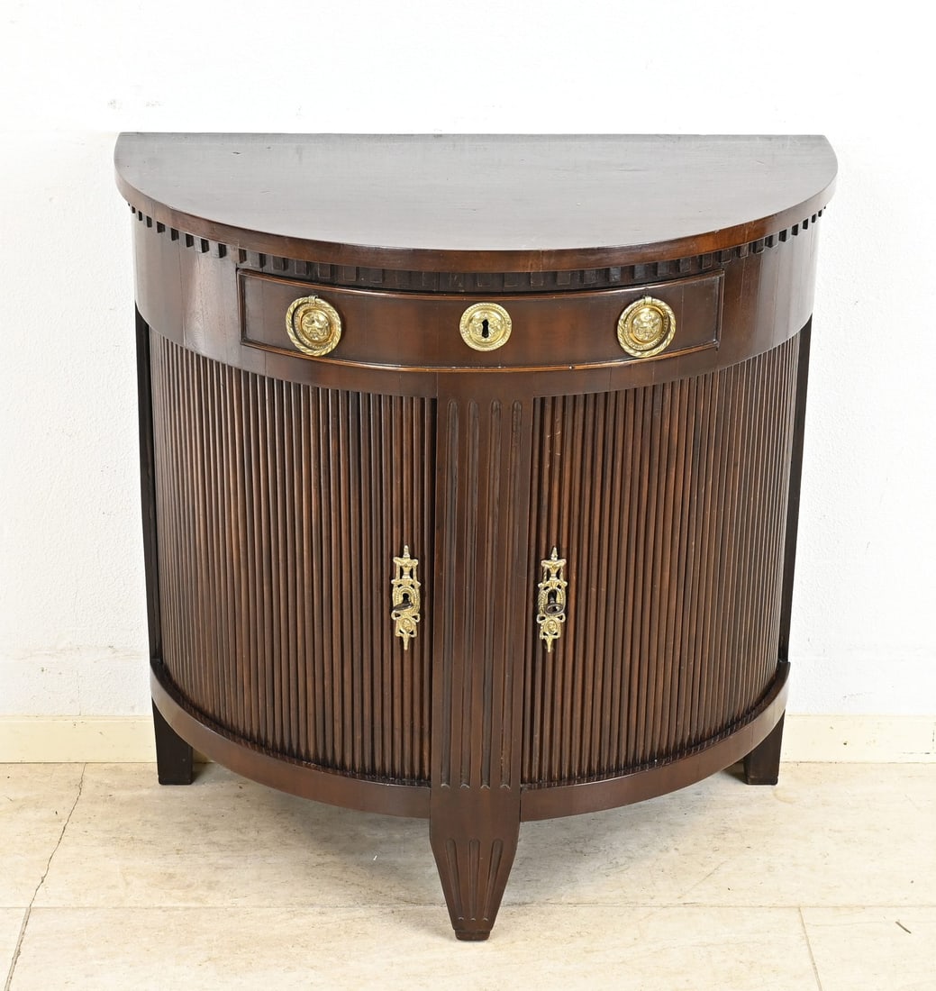 Half-moon cabinet (roller door): Early 19th-century Dutch mahogany half-moon cabinet with roll-up doors, original fittings, lock and key. Dimensions: 75 x 74 x 40 cm. In good condition.