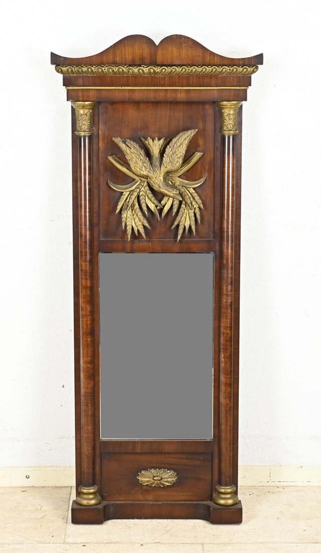 Mirror, 124 51 cm.: 19th-century North German Biedermeier mahogany mirror with half-columns and gilded bird on ears of corn. Dimensions: 124 x 51 cm. In good condition.