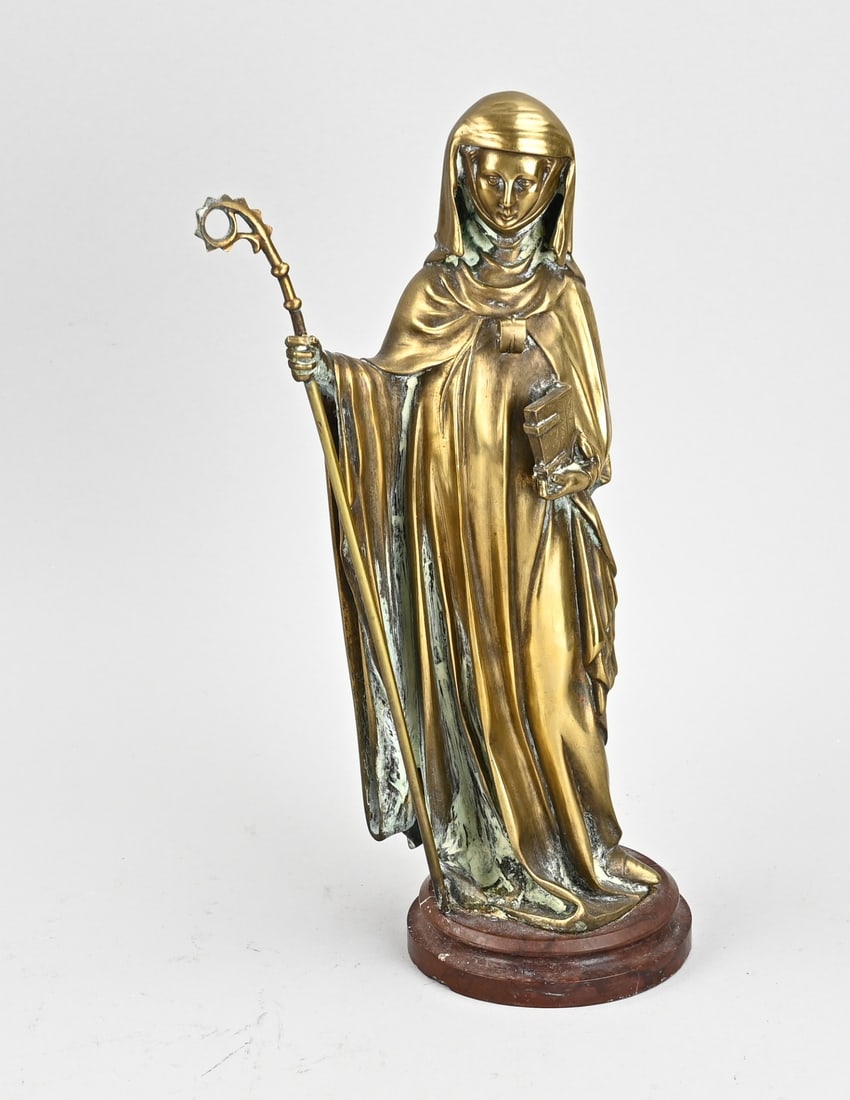 Religious bronze figure, H 31 cm.: Antique religious bronze figure with Bible and staff, possibly Saint Theresa. 19th century. Dimensions: H 31 cm. In good condition.