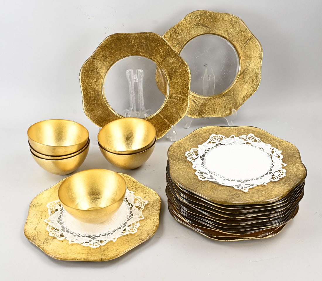 14x Glass coasters + 6x bowls: Fourteen large Italian gilded glass plates and six glass bowls. Second half of the 20th century. Dimensions: 16 x 34 cm. In good condition.