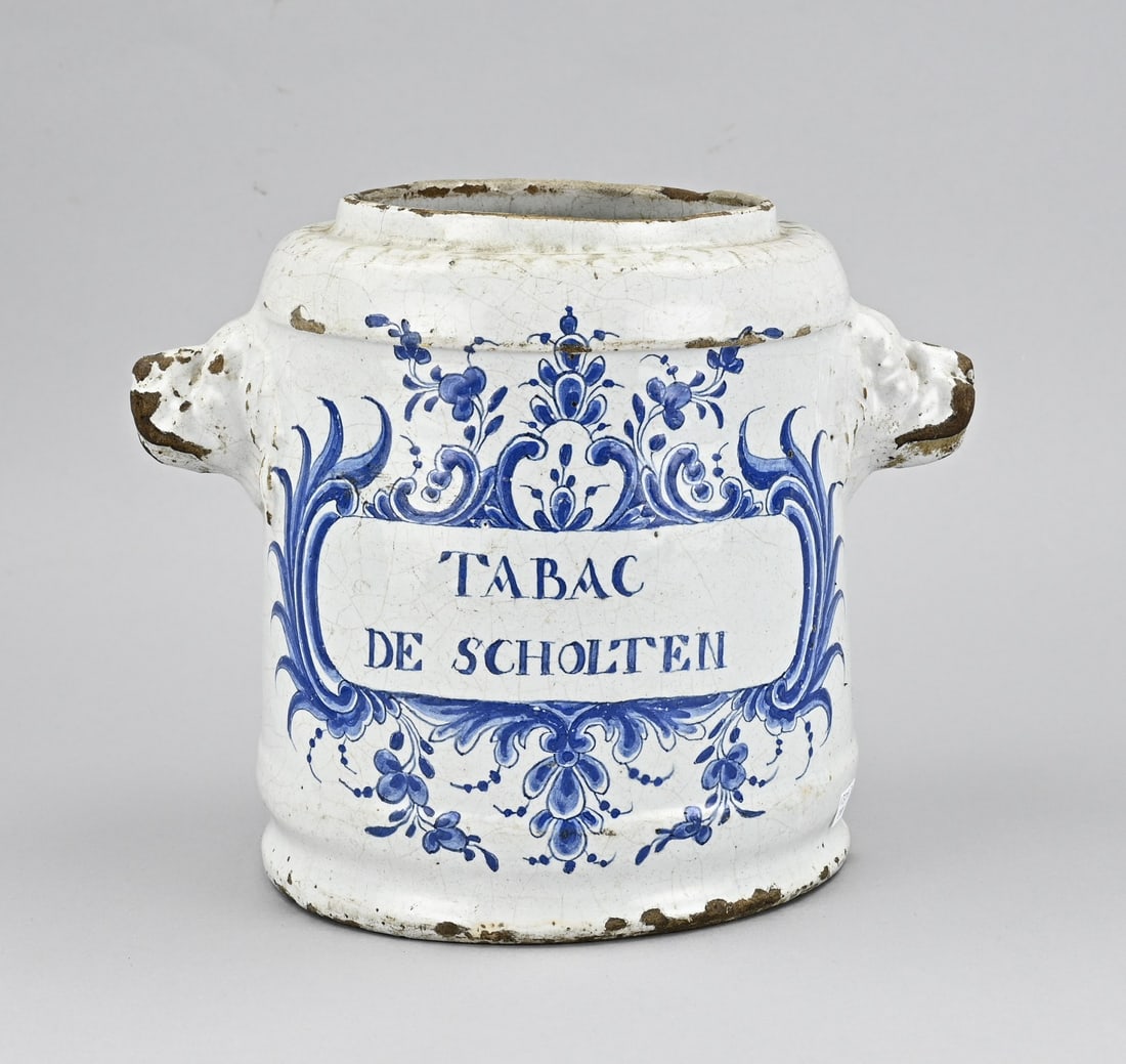 Tobacco jar Ø 26 cm.: Large 18th-century Belgian faience tobacco jar 'Tabac de Scholten', with lion heads. Dimensions: H 22 x Ø 18 cm. In good condition.