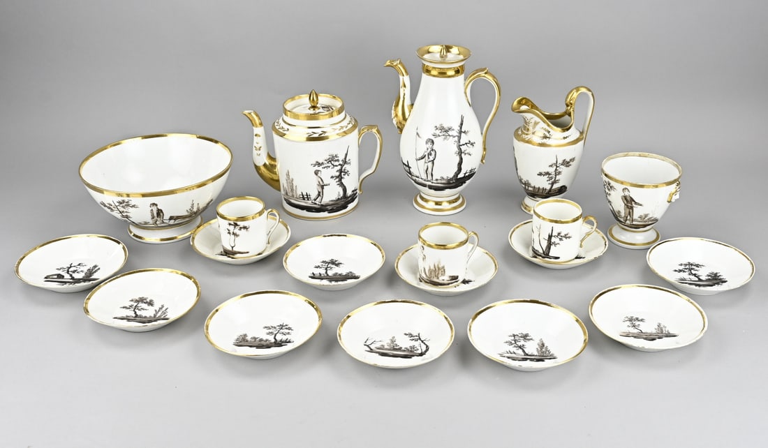16-Piece tea set: 16-piece early 19th-century hand-painted porcelain tea set with decoration of figures in a landscape + gilding (various). Dimensions: 6.5 x 26 cm. In good condition.