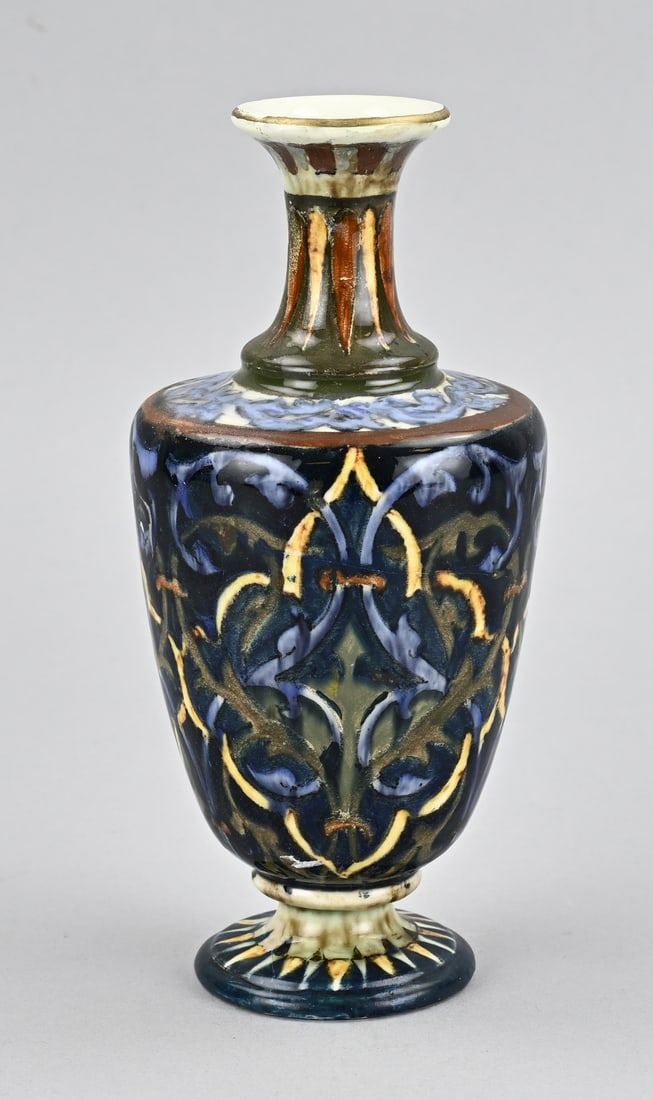 Rozenburg The Hague earthenware vase, H 20 cm.: Antique Rozenburg The Hague polychrome earthenware vase with floral decoration. Circa 1893. Dimensions: H 20 cm. Restored, neck and base. In reasonable condition.