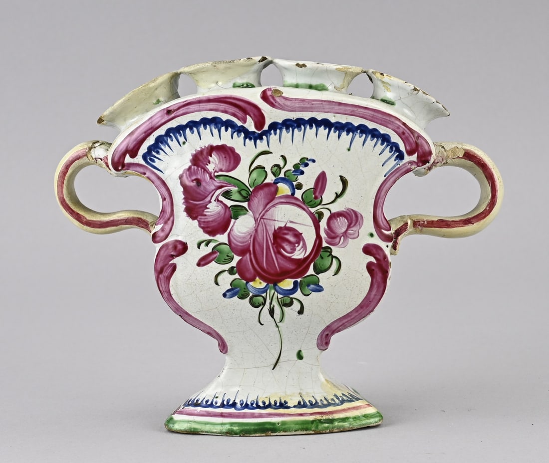 Tulip vase: 18th-century polychrome faience tulip vase. Both handles glued. Dimensions: 15 x 19 x 5 cm. In good condition.