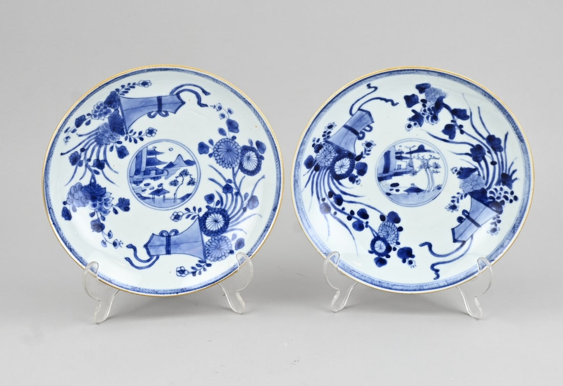 2x Chinese plate Ø 22 cm.: Two 18th-century Chinese porcelain Kang Xi plates with landscape/floral decoration, reverse side with chamois leather glaze. Dimensions: Ø 22 cm. Both plates have hairline cracks. In fair/good