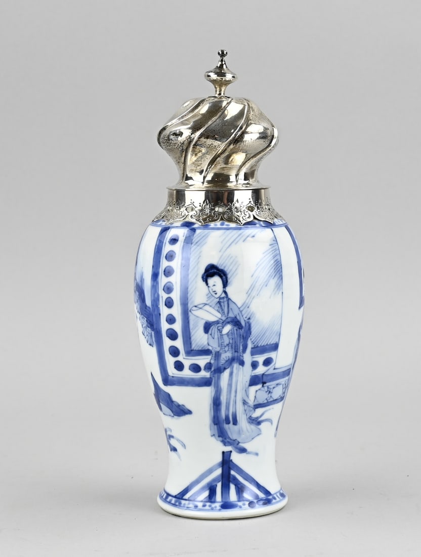 Chinese tea caddy with silver lid: 17th - 18th Century Chinese porcelain Kang Xi tea caddy with decoration of four various geishas + silver mount. Base mark. Dimensions: H 24.2 cm. Minimal hairline cracks. In fair/good condition.