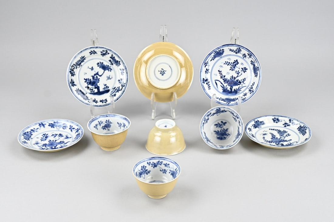 Lot of Chinese porcelain (9 pieces): Four 18th-century Chinese porcelain kang xi cups and saucers with garden and chamois leather decoration. One cup is in good condition. One cup has a chip. One cup has a hairline crack and a chip. One