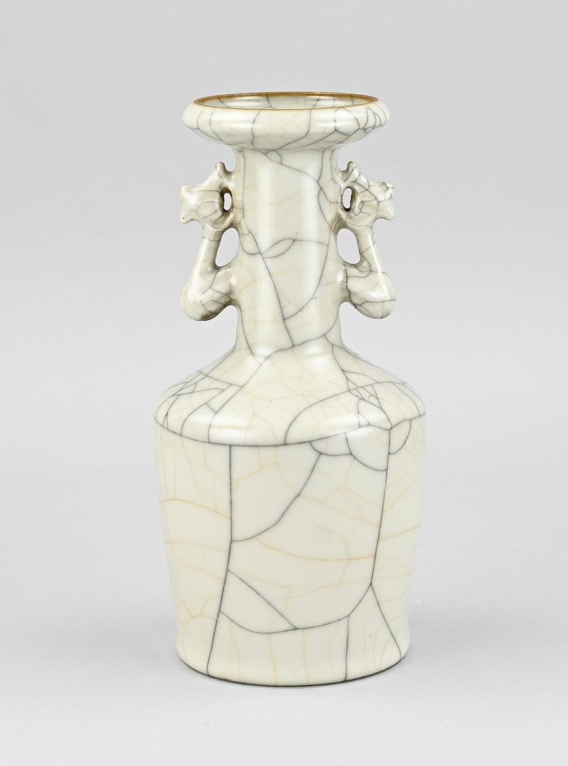 Celadon vase, H 24.2 cm.: Old Chinese porcelain celadon ear vase with six-character base mark. Dimensions: H 24.2 cm. In good condition.
