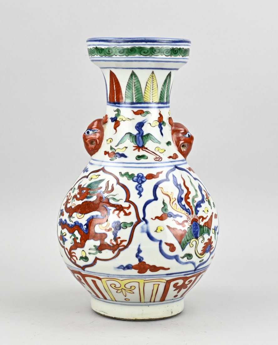 Chinese Wucai vase, H 32 cm.: Old Chinese porcelain wucai vase. Polychrome, with dragon/phoenix decoration + rim signature. Dimensions: H 32 cm. In good condition.