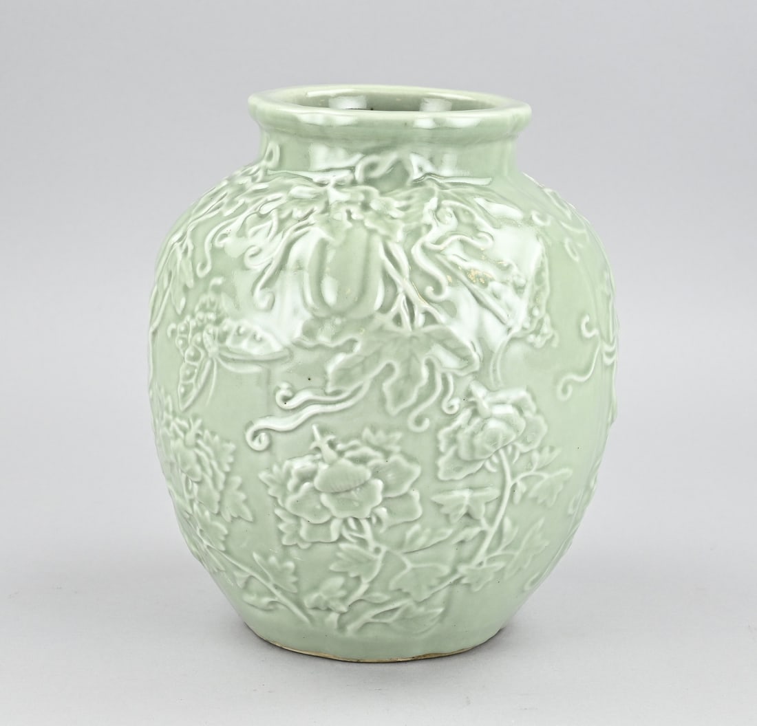 Celadon vase, H 25.5 cm.: Old Chinese porcelain celadon vase with butterfly and vine decoration. Dimensions: H 25.5 cm. In good condition.
