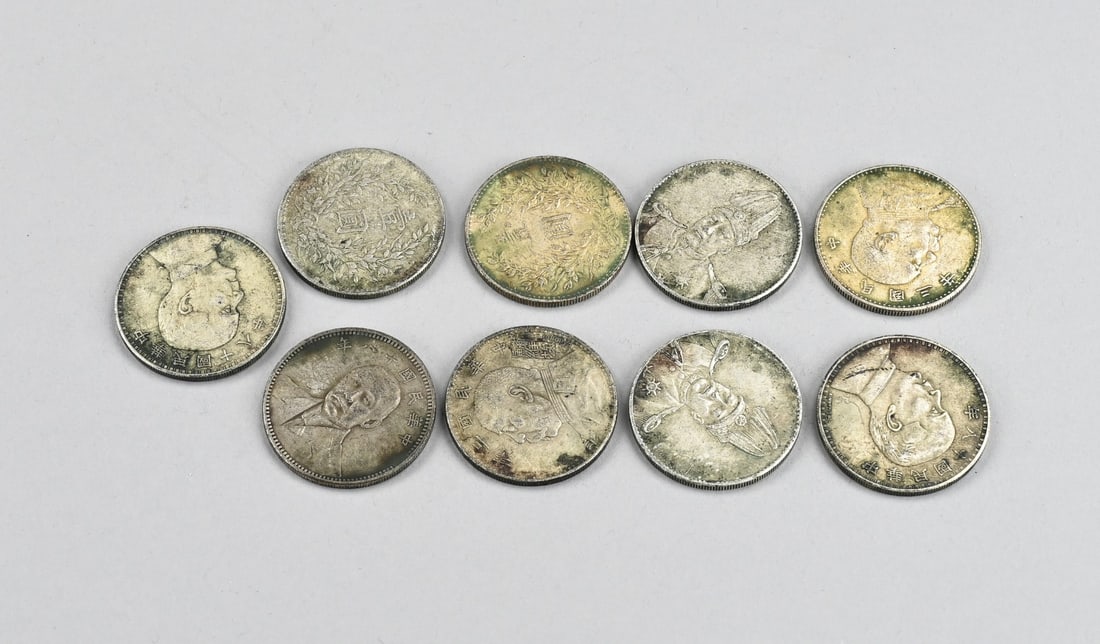 Lot of Chinese pennies/coins (9x): Lot of 9 old Chinese coins. 20th century. Dimensions: Ø 4 cm. In good condition.