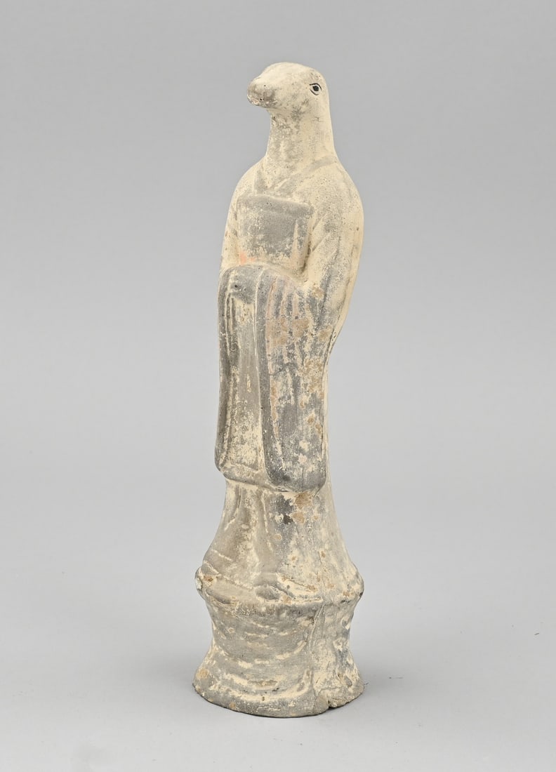 Chinese terracotta figure, H 28 cm.: Old/antique Chinese terracotta figure in Tang style, with a snake head. Age? Dimensions: H 28 cm. In good condition.