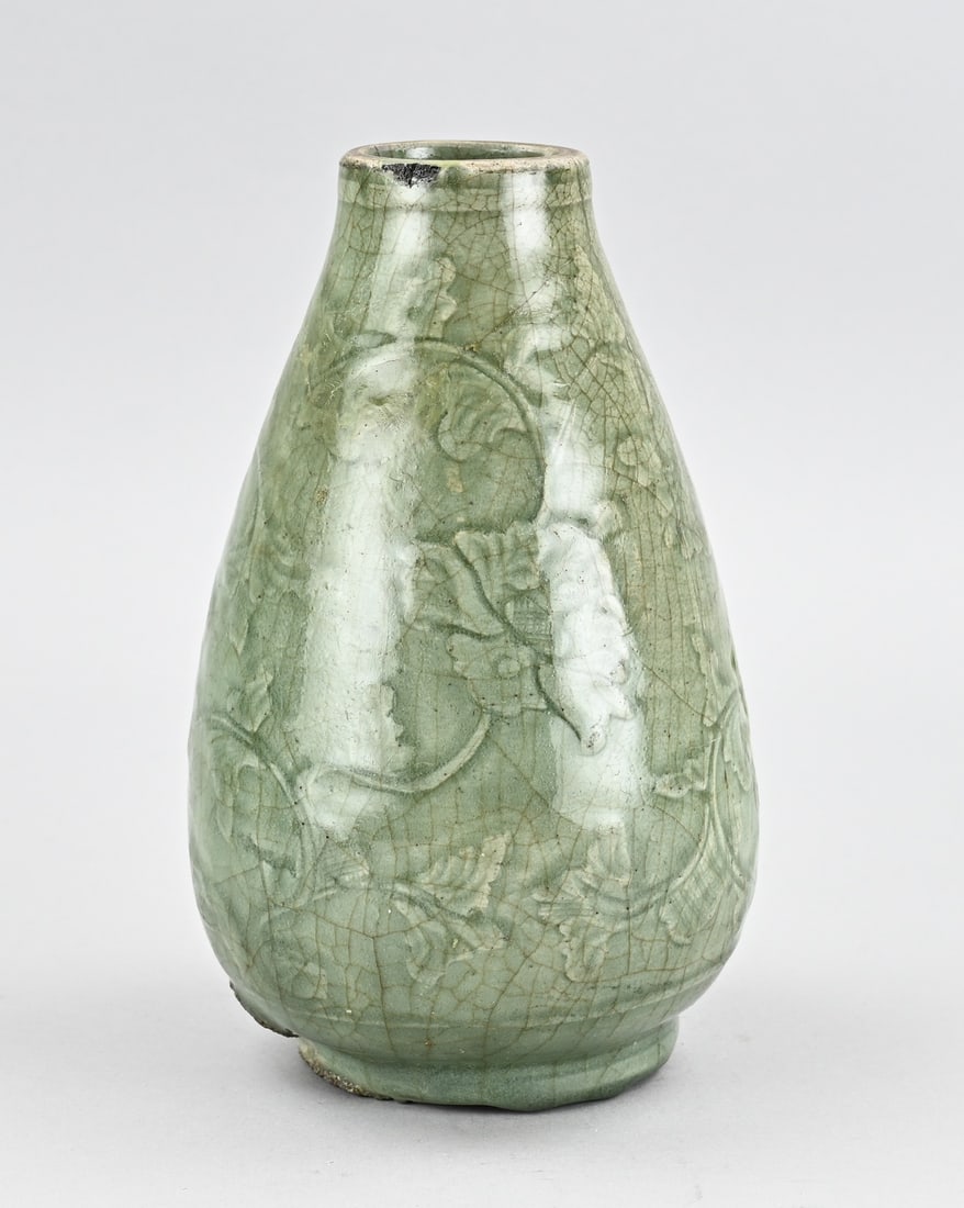 Celadon vase, H 24 cm.: Old Chinese porcelain celadon vase with floral decoration. Dimensions: H 24 cm. In good condition.